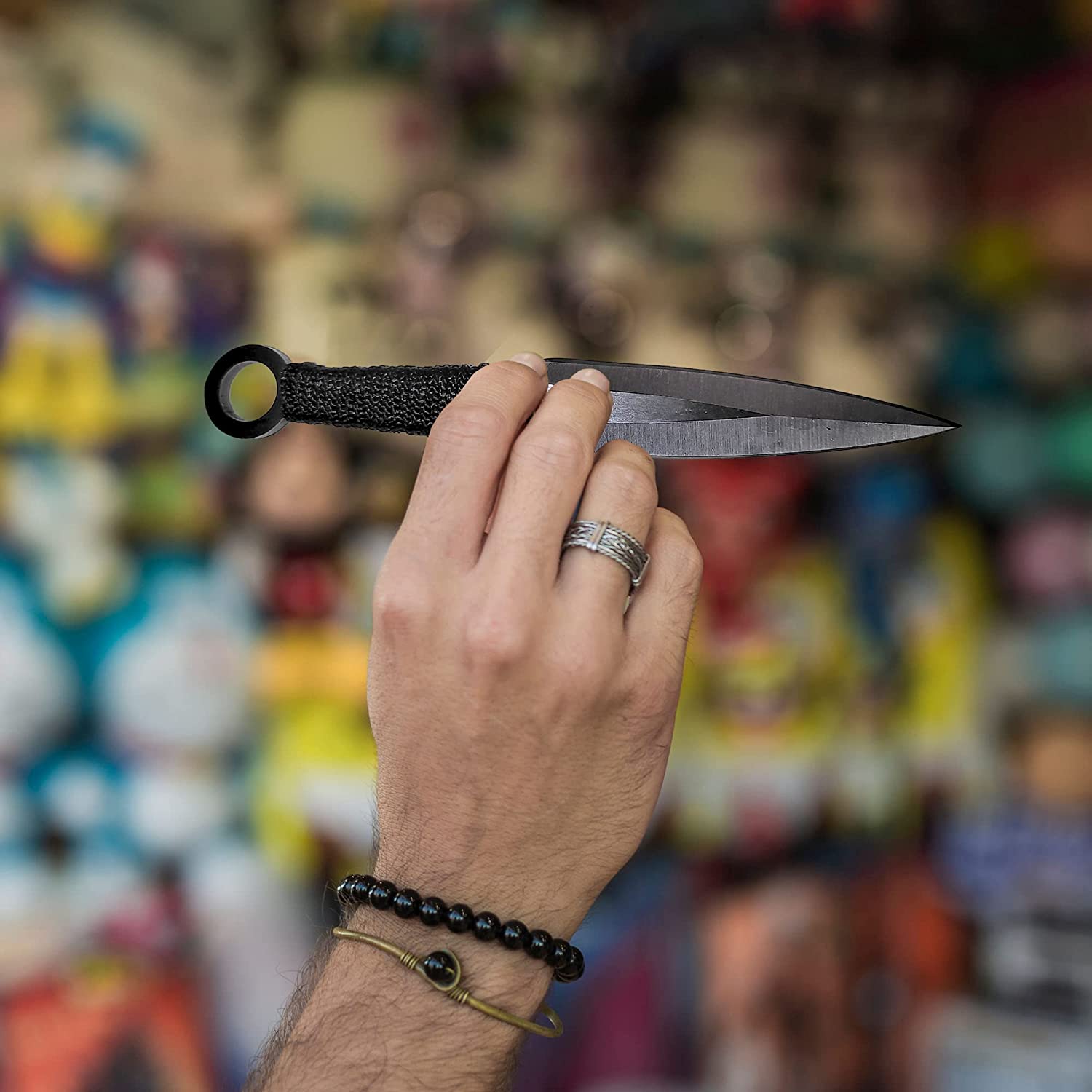 12 black and silver throwing knives with target