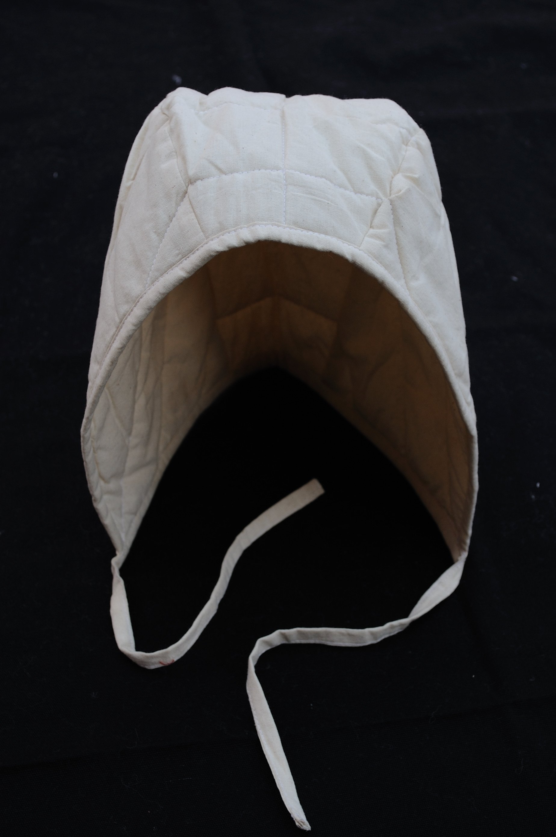 Padded arming cap