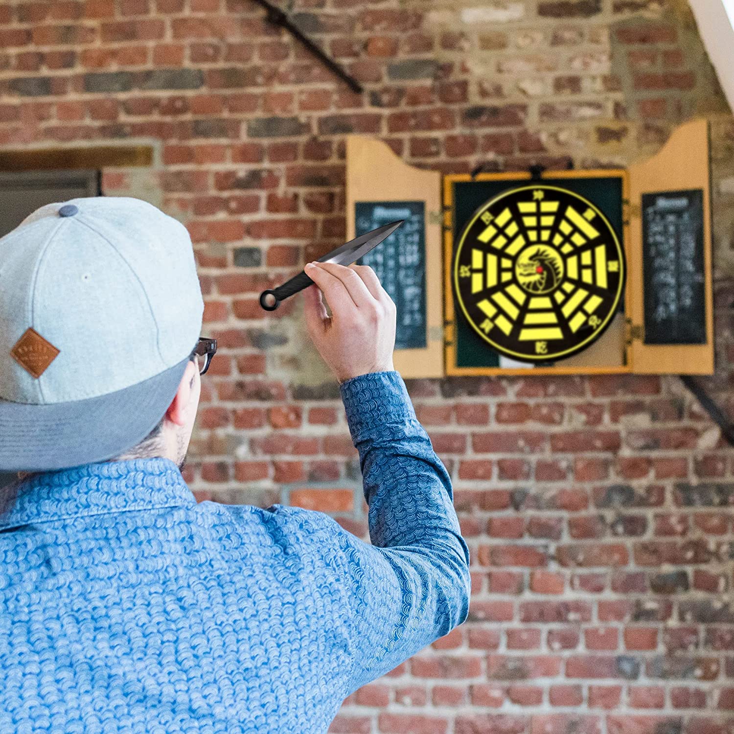12 black and silver throwing knives with target